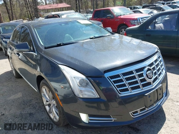 2013 Cadillac XTS Premium with VIN 2G61S5S33D9113653, listed as a IAAI auction lot 41837117 with 101,049 mi miles and . Bid and sale history available at DreamBid. Image 1.