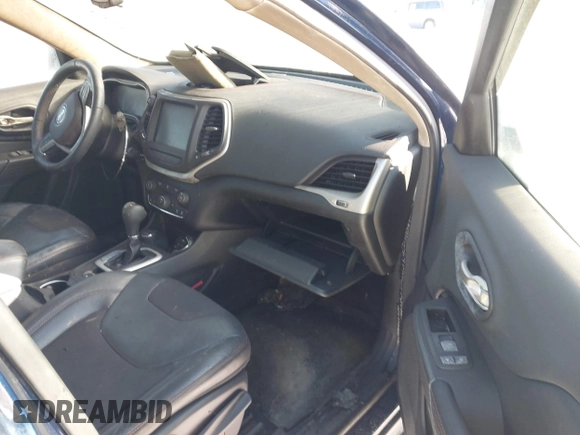 2014 Jeep Cherokee Trailhawk with VIN 1C4PJMBS8EW182259, listed as a IAAI auction lot 41309329 with Not Provided miles. Bid and sale history available at carsss.com. Image 5.