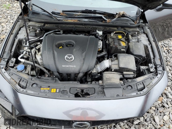 2019 Mazda 3 with VIN JM1BPBJMXK1142158, listed as a Copart auction lot 59874944 with 60,256 mi miles and Salvage title. Bid and sale history available at DreamBid. Image 11.