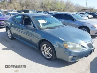 2006 Pontiac Grand Prix GT z VIN 2G2WR584161218003, wystawiony jako IAAI lot #41841165 z przebiegiem 174 353 mil mil oraz . Historia ofert i sprzedaży dostępna na DreamBid. Obrazek 1.