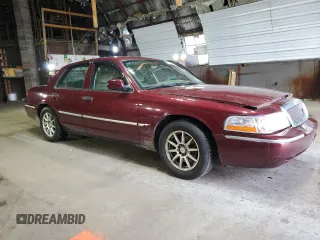 2004 Mercury Grand Marquis GS with VIN 2MEFM74W24X627374, listed as a Copart auction lot 50508605 with 118,635 mi miles and Salvage Title. Bid and sale history available at DreamBid. Image 4.