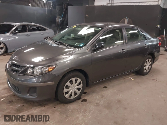 2011 Toyota Corolla L with VIN JTDBU4EE3BJ102060, listed as a IAAI auction lot 42140081 with 125,989 mi miles. Bid and sale history available at carsss.com. Image 17.