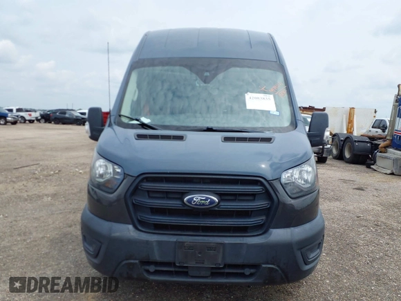 2020 Ford Transit Cargo with VIN 1FTBR3X83LKA48242, listed as a IAAI auction lot 42083835 with 74,963 mi miles. Bid and sale history available at carsss.com. Image 12.