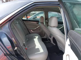 2009 Cadillac CTS RWD w/1SA with VIN 1G6DF577790133127, listed as a IAAI auction lot 41810358 with 220,278 mi miles. Bid and sale history available at carsss.com. Image 8.