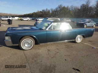 1965 Lincoln Continental with VIN 5Y86N428064, listed as a Copart auction lot 76812744 with 15,659 mi miles and Salvage Title. Bid and sale history available at DreamBid. Image 1.