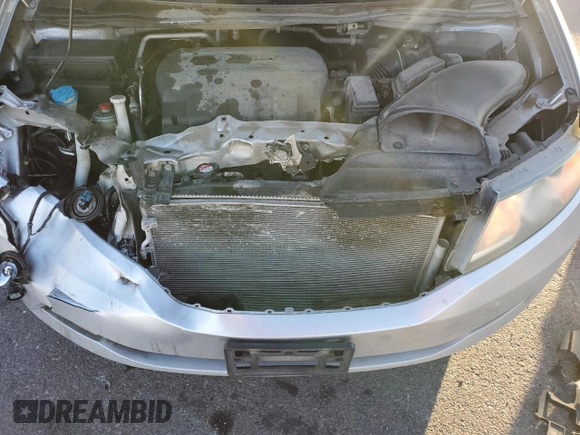 2015 Honda Odyssey EX-L with VIN 5FNRL5H69FB077433, listed as a Copart auction lot 88999285 with 193,926 mi miles and Salvage Title. Bid and sale history available at DreamBid. Image 14.