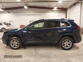 2014 Jeep Cherokee Latitude with VIN 1C4PJMCS9EW239549, listed as a IAAI auction lot 41156954 with 167,331 mi miles and . Bid and sale history available at DreamBid. Image 14.