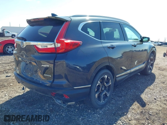 2018 Honda CR-V Touring with VIN 7FARW2H94JE044336, listed as a IAAI auction lot 41934128 with 70,861 mi miles. Bid and sale history available at carsss.com. Image 4.