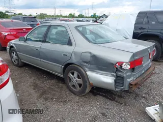 2001 Toyota Camry CE z VIN JT2BG22K410587070, wystawiony jako IAAI lot #42388043 z przebiegiem 119 183 mil mil oraz . Historia ofert i sprzedaży dostępna na DreamBid. Obrazek 3.