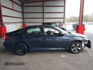 2019 Honda Civic Sedan LX with VIN 19XFC2F6XKE201052, listed as a IAAI auction lot 41961558 with 94,149 mi miles. Bid and sale history available at carsss.com. Image 14.