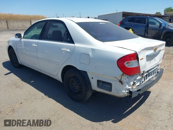 2002 Toyota Camry LE z VIN 4T1BE32K82U038819, wystawiony jako IAAI lot #42301111 z przebiegiem 189 166 mil mil oraz . Historia ofert i sprzedaży dostępna na DreamBid. Obrazek 3.