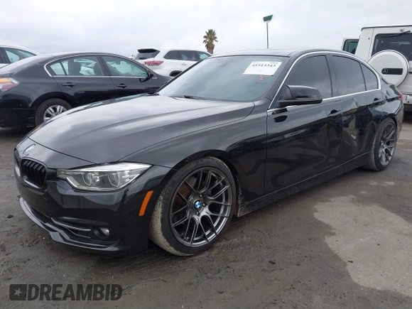2018 BMW 3 Series 330i xDrive with VIN WBA8D9G57JNU67415, listed as a IAAI auction lot 41513343 with 98,714 mi miles. Bid and sale history available at carsss.com. Image 2.