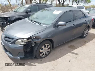 2011 Toyota Corolla L with VIN 2T1BU4EEXBC559590, listed as a IAAI auction lot 42101256 with 163,307 mi miles and . Bid and sale history available at DreamBid. Image 2.