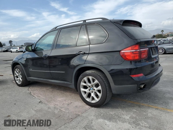 2012 BMW X5 35i z VIN 5UXZV4C51CL989449, wystawiony jako Copart lot #56762095 z przebiegiem 112 576 mil mil oraz Szkoda całkowita • Salvage title. Historia ofert i sprzedaży dostępna na DreamBid. Obrazek 2.