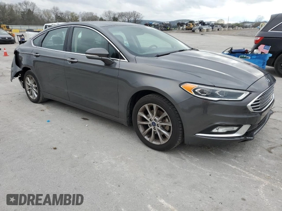 2017 Ford Fusion SE with VIN 3FA6P0HDXHR388319, listed as a Copart auction lot 51466285 with 176,811 mi miles and Salvage Title. Bid and sale history available at DreamBid. Image 4.