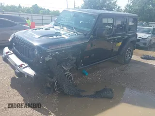 2024 Jeep Wrangler Rubicon with VIN 1C4PJXFG0RW271322, listed as a IAAI auction lot 42736647 with 32,319 mi miles and . Bid and sale history available at DreamBid. Image 17.