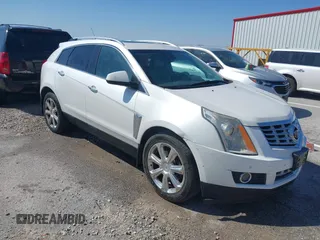 2015 Cadillac SRX Performance Collection with VIN 3GYFNFE39FS609715, listed as a IAAI auction lot 41984973 with 163,533 mi miles and . Bid and sale history available at DreamBid. Image 1.