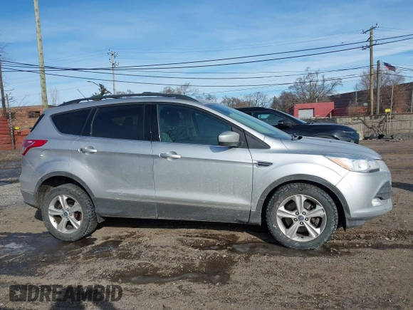 2013 Ford Escape SE with VIN 1FMCU9G98DUD51808, listed as a IAAI auction lot 41527022 with 141,471 mi miles. Bid and sale history available at carsss.com. Image 13.