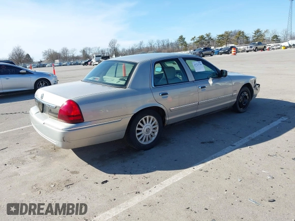 2010 Mercury Grand Marquis LS z VIN 2MEBM7FV4AX608503, wystawiony jako IAAI lot #41721726 z przebiegiem 172 907 mil mil oraz . Historia ofert i sprzedaży dostępna na DreamBid. Obrazek 4.