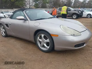 2002 Porsche Boxster z VIN WP0CA298X2U621305, wystawiony jako IAAI lot #41516222 z przebiegiem 107 248 mil mil oraz . Historia ofert i sprzedaży dostępna na DreamBid. Obrazek 1.