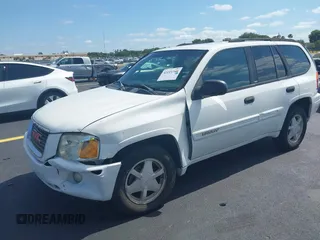 2003 GMC Envoy SLT z VIN 1GKDS13S532221928, wystawiony jako IAAI lot #42211340 z przebiegiem 149 902 mil mil oraz . Historia ofert i sprzedaży dostępna na DreamBid. Obrazek 2.