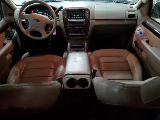 2005 Ford Explorer with VIN 1FMDU75K05ZA54907, listed as a Copart auction lot 80825574 with 154,681 mi miles and Salvage title. Bid and sale history available at DreamBid. Image 8.
