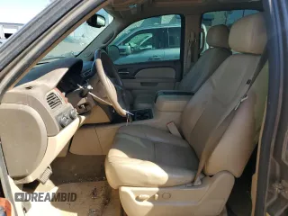 2013 GMC Yukon SLT with VIN 1GKS2CE02DR318091, listed as a Copart auction lot 70860184 with 127,879 mi miles and Salvage Title. Bid and sale history available at carsss.com. Image 7.
