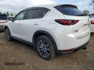 2019 Mazda CX-5 Signature with VIN JM3KFBEYXK0537826, listed as a Copart auction lot 50063015 with 76,448 mi miles and Salvage Title. Bid and sale history available at carsss.com. Image 2.