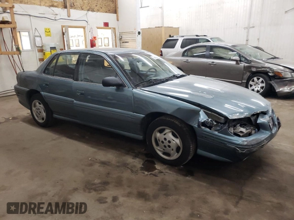 1997 Pontiac Grand Am SE with VIN 1G2NE52M8VC721326, listed as a Copart auction lot 75860034 with 110,209 mi miles and Salvage title. Bid and sale history available at DreamBid. Image 4.