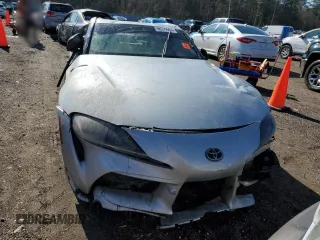 2021 Toyota GR Supra 2.0 with VIN WZ1DB2C00MW037881, listed as a Copart auction lot 86379904 with 0 mi miles and Salvage Title. Bid and sale history available at carsss.com. Image 5.