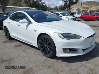 2018 Tesla Model S 75D with VIN 5YJSA1E22JF246928, listed as a IAAI auction lot 41869364 with 100,067 mi miles and . Bid and sale history available at DreamBid. Image 1.