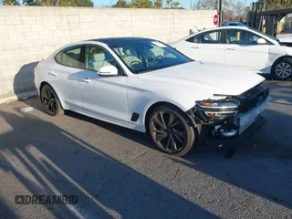 2023 Genesis G70 2.0T with VIN KMTG34TA7PU112073, listed as a IAAI auction lot 41825012 with 10,526 mi miles. Bid and sale history available at carsss.com. Image 1.