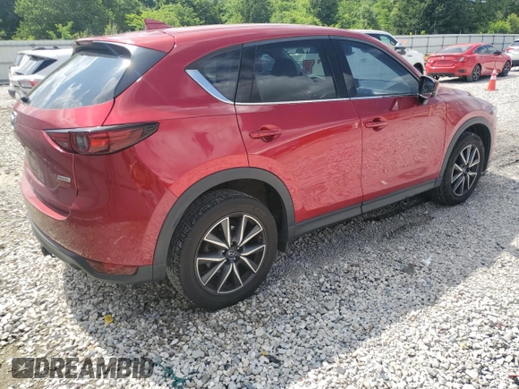 2018 Mazda CX-5 Grand Touring с VIN JM3KFBDM1J0332117, выставлен на аукционе Copart как лот 59379085 с пробегом 95 527 миль миль и Списание • Salvage title. История ставок и продаж доступна на DreamBid. Изображение 3.
