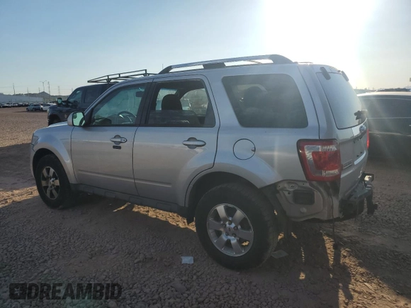 2011 Ford Escape Limited with VIN 1FMCU9EG2BKA74440, listed as a Copart auction lot 61081835 with 136,933 mi miles and Salvage title. Bid and sale history available at DreamBid. Image 2.