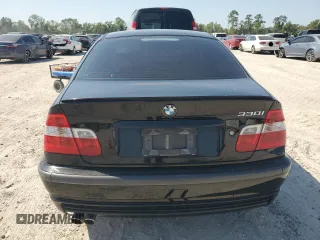 2005 BMW 3 Series 330i with VIN WBAEV53405KM43213, listed as a Copart auction lot 74597414 with 182,881 mi miles and Salvage Title. Bid and sale history available at carsss.com. Image 6.