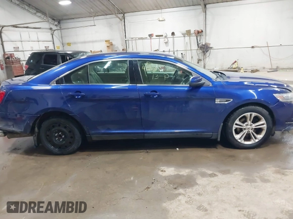 2013 Ford Taurus SEL with VIN 1FAHP2E82DG149828, listed as a IAAI auction lot 41910513 with 130,594 mi miles and . Bid and sale history available at carsss.com. Image 14.