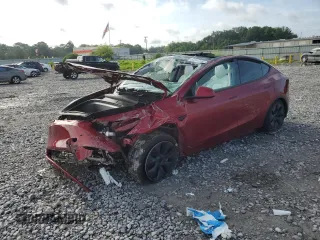 2024 Tesla Model Y z VIN 7SAYGDED2RA331985, wystawiony jako Copart lot #60240705 z przebiegiem Nie podano mil oraz Szkoda całkowita • Salvage title. Historia ofert i sprzedaży dostępna na DreamBid. Obrazek 1.