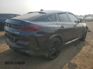 2021 BMW X6 M50i with VIN 5UXCY8C05M9H31042, listed as a Copart auction lot 64614714 with 0 mi miles and Salvage Title. Bid and sale history available at carsss.com. Image 3.