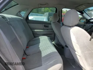 2004 Ford Taurus SE with VIN 1FAFP53U24A137741, listed as a Copart auction lot 54313915 with 92,739 mi miles and Salvage Title. Bid and sale history available at DreamBid. Image 10.