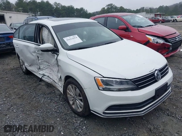 2015 Volkswagen Jetta Sedan 1.8T SE with VIN 3VWD17AJ6FM237674, listed as a IAAI auction lot 41613054 with 71,325 mi miles. Bid and sale history available at carsss.com. Image 1.