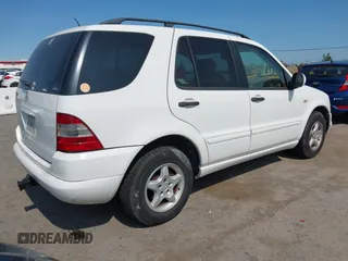 2001 Mercedes-Benz M 320/430/500 with VIN 4JGAB54E11A277233, listed as a IAAI auction lot 42519040 with 307,219 mi miles and . Bid and sale history available at DreamBid. Image 4.