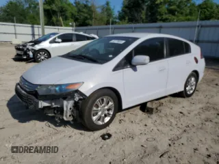 2010 Honda Insight EX z VIN JHMZE2H77AS035113, wystawiony jako Copart lot #54179005 z przebiegiem 165 083 mil mil oraz Szkoda całkowita • Salvage title. Historia ofert i sprzedaży dostępna na DreamBid. Obrazek 1.