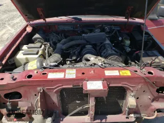 1997 Ford Ranger XLT z VIN 1FTCR10A0VPB04021, wystawiony jako Copart lot #57915095 z przebiegiem 169 821 mil mil oraz Szkoda całkowita • Salvage title. Historia ofert i sprzedaży dostępna na DreamBid. Obrazek 11.