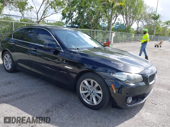 2015 BMW 5 Series 528i with VIN WBA5A5C57FD512845, listed as a IAAI auction lot 41954256 with 174,944 mi miles. Bid and sale history available at carsss.com. Image 1.