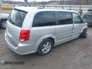 2011 Dodge Grand Caravan Crew with VIN 2D4RN5DG0BR751611, listed as a IAAI auction lot 41683889 with 181,551 mi miles and . Bid and sale history available at DreamBid. Image 4.