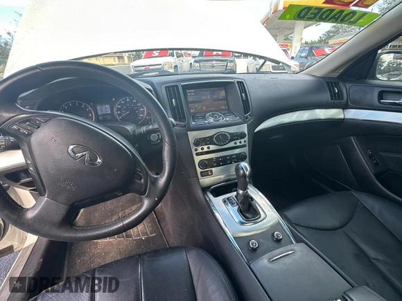 2015 Infiniti Q60 S Limited с VIN JN1CV6EK5FM871010, выставлен на аукционе Copart как лот 87052914 с пробегом 122 669 миль миль и Чистый • Clean title. История ставок и продаж доступна на DreamBid. Изображение 9.