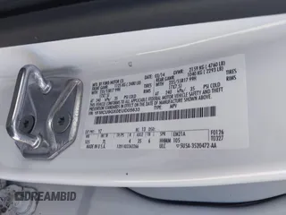 2014 Ford Escape SE with VIN 1FMCU9GX0EUD05633, listed as a IAAI auction lot 41582757 with 103,729 mi miles. Bid and sale history available at carsss.com. Image 9.