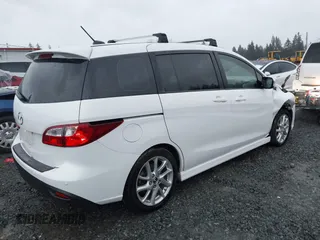 2015 Mazda Mazda5 Grand Touring with VIN JM1CW2DL6F0185594, listed as a IAAI auction lot 41470568 with 116,309 mi miles. Bid and sale history available at carsss.com. Image 4.