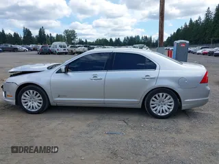 2012 Ford Fusion Hybrid with VIN 3FADP0L35CR440051, listed as a IAAI auction lot 42644284 with 89,087 mi miles and . Bid and sale history available at DreamBid. Image 14.