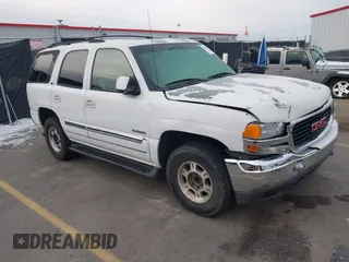 2002 GMC Yukon SLT with VIN 1GKEC13Z22J274962, listed as a IAAI auction lot 41387262 with 283,660 mi miles. Bid and sale history available at carsss.com. Image 1.